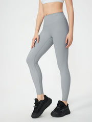 Light gray ribbed high-waist leggings with a sculpted fit.
