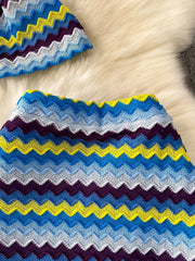 Chevron knit halter crop top and maxi skirt set in blue, yellow, and purple.