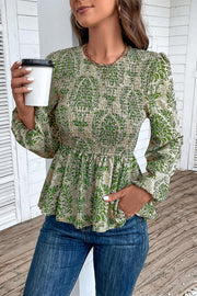 Green damask print peplum blouse with smocking and puff sleeves