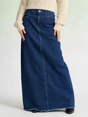 Dark blue denim maxi skirt with raw hem and button closure, cotton.