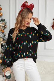 Black acrylic sweater with festive Christmas lights pattern, crew neck, and long sleeves.