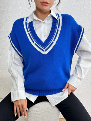 Blue acrylic knit vest with varsity stripes and pearl trim detail.