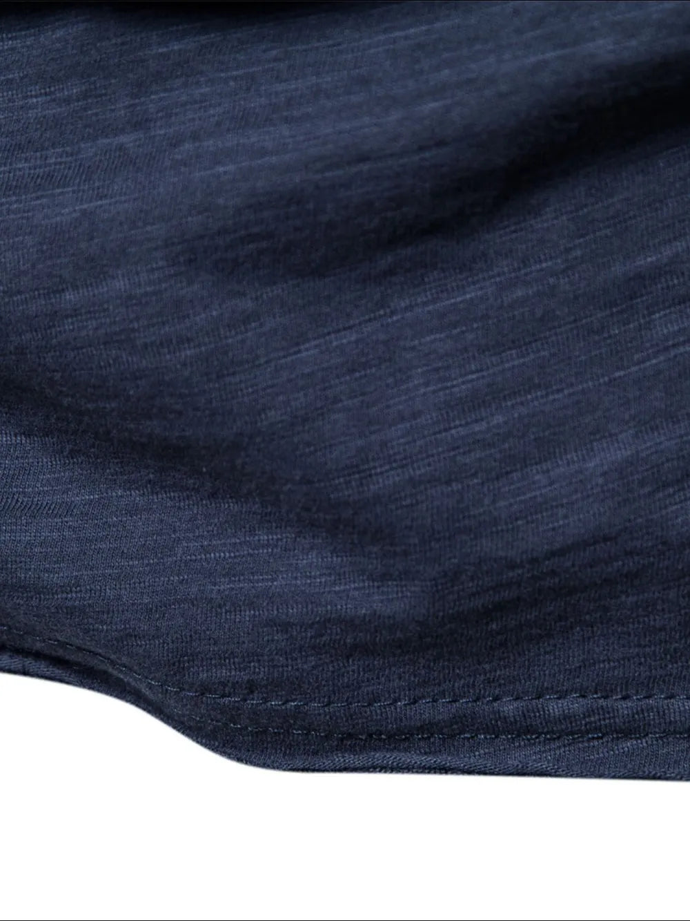Navy slub cotton crewneck tee with textured fabric detail.