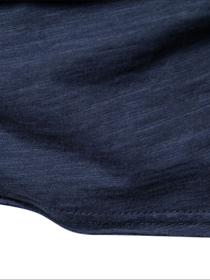 Navy slub cotton crewneck tee with textured fabric detail.