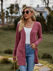 Longline ribbed knit button-down cardigan in Rust with pockets.