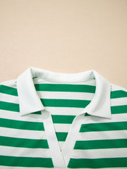 Green and white striped cotton blouse with a white collar and V-neck detail.