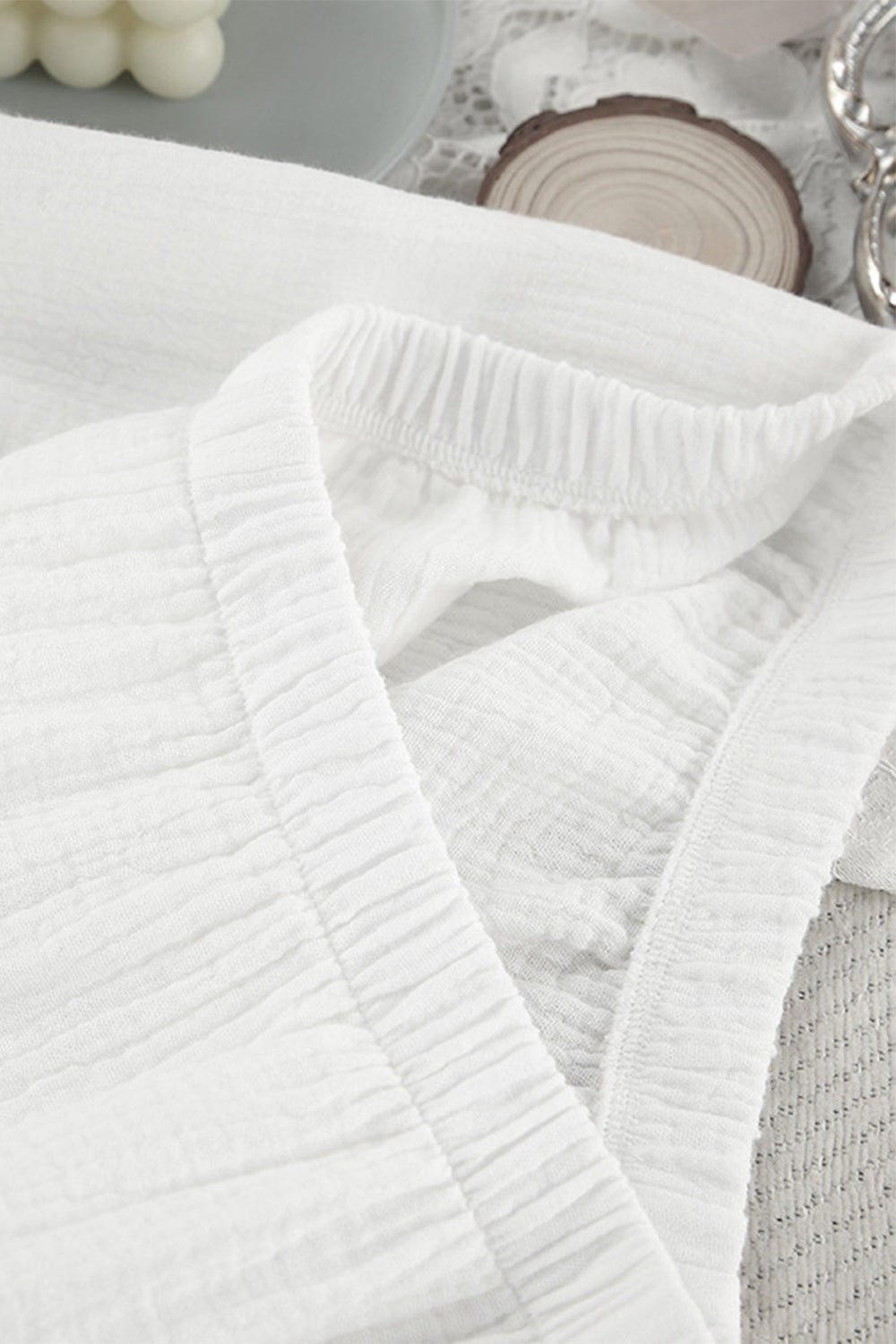 White gauze loungewear set with a V-neck and elastic waistband detail