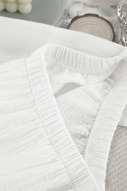 White gauze loungewear set with a V-neck and elastic waistband detail