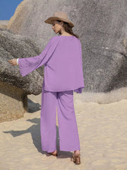 Purple lace-embellished open front set with wide leg pants and bell sleeves.