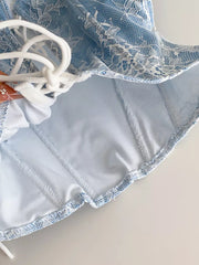Blue floral lace tube top with white lace-up detail and corset stitching.