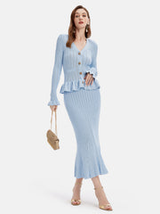 Light blue knit cardigan with ruffled hem and matching mermaid skirt.