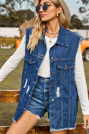 Distressed dark denim sleeveless jacket with frayed hem and pockets.
