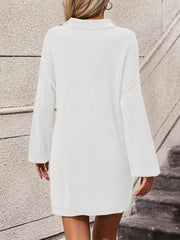 White ribbed knit polo dress with long sleeves and a collar.