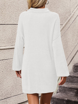 White ribbed knit polo dress with long sleeves and a collar.
