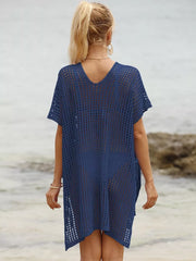 Dark blue V-neck ruched cover-up with a textured open-knit pattern.