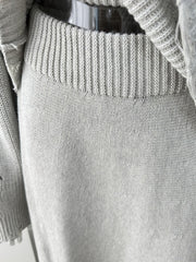 Light gray distressed cotton sweater set with ribbed neckline and deconstructed details.