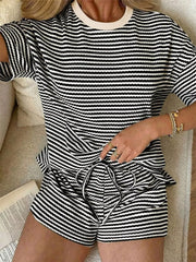 Black and white striped two-piece set with drawstring shorts and crew neck top