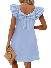 Light blue a-line dress with ruffled cap sleeves and a large back bow detail.