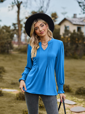 Sky blue long sleeve blouse with pleated yoke and shirred cuffs