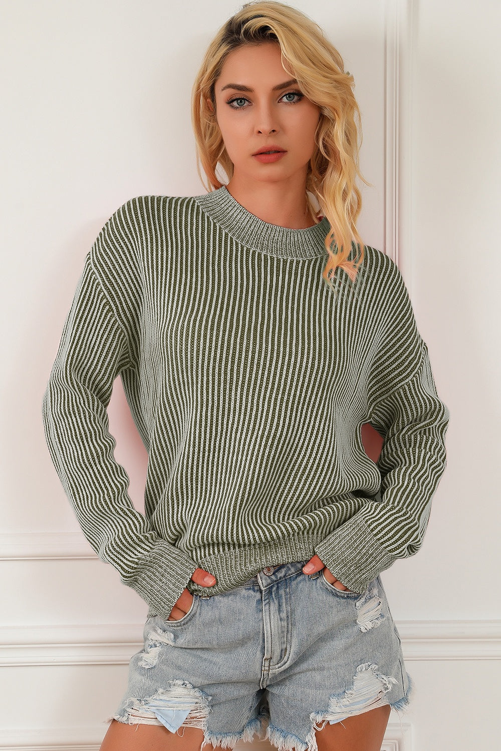 Sage vertical ribbed acrylic mock neck pullover sweater with cuffed sleeves.