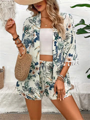 Botanical print kimono with tassel trim and matching drawstring shorts set in light green.