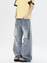 Men's light wash distressed wide-leg jeans, 100% cotton, relaxed fit.