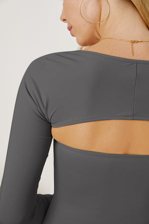 Dark gray long sleeve bodysuit with open back detail