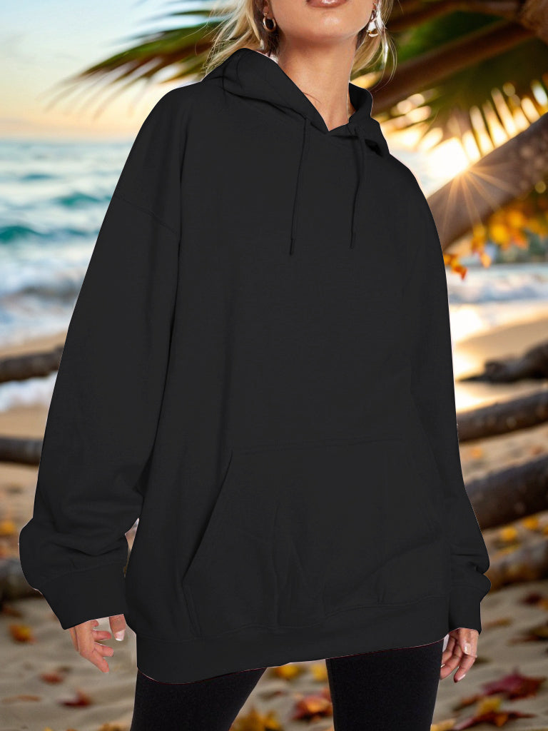 Black oversized hoodie with pouch pocket and drawstring hood, casual relaxed fit