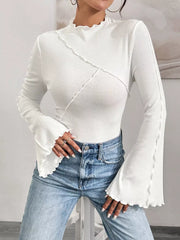 White lettuce edge flare sleeve t-shirt with seam detail and mock neck