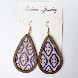 Cork teardrop earrings with blue botanical print and wooden frame