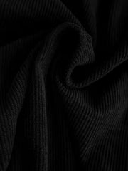 Black corduroy fabric detail showing ribbed texture.