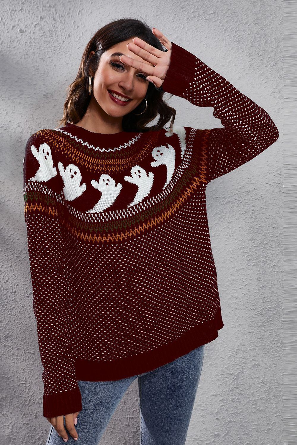 Wine crewneck sweater with jacquard ghost pattern and textured knit.