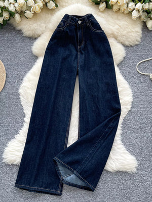 Dark wash denim maternity jeans with a high rise and wide leg cut.
