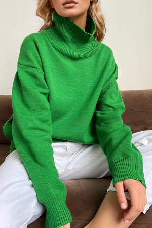Green oversized cashmere turtleneck sweater with ribbed cuffs and collar.
