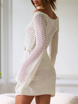 Crochet lace-up cutout mini dress in cream with long sleeves and a sheer knit pattern.