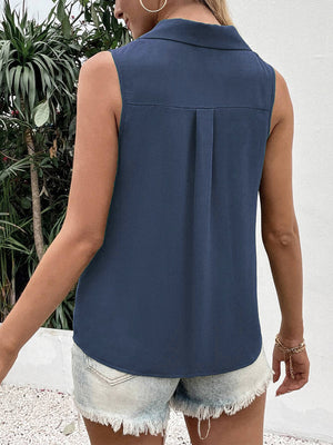 Dusty blue sleeveless collared blouse with back pleat detail
