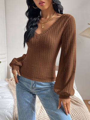 Brown textured chevron blouson top with V-neck and balloon sleeves