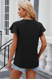 Black V-neck flutter sleeve blouse with a relaxed fit.