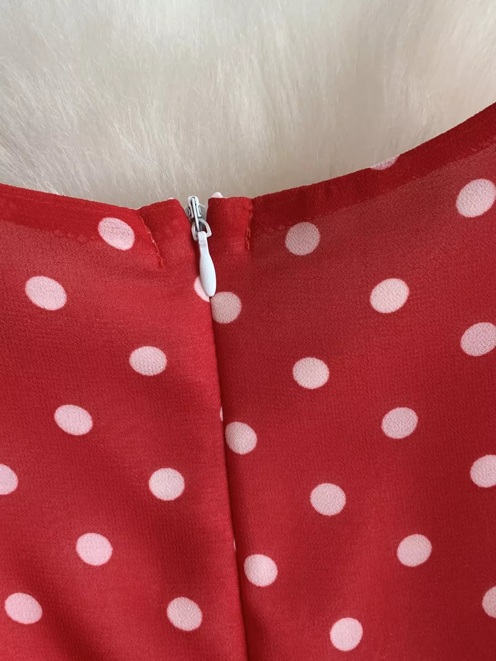 Red polka dot dress with zipper detail