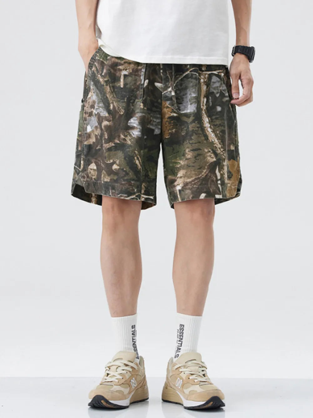 Men's camouflage trunks in Black Forest pattern, featuring a comfortable elastic waistband and casual cut.