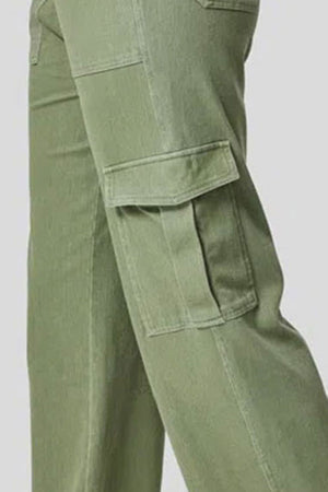 Utility denim wide-leg cargo pants in Matcha Green with flap pockets.
