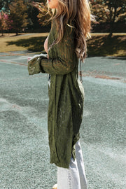 Openwork maxi cardigan in army green acrylic with long sleeves and an open knit pattern.