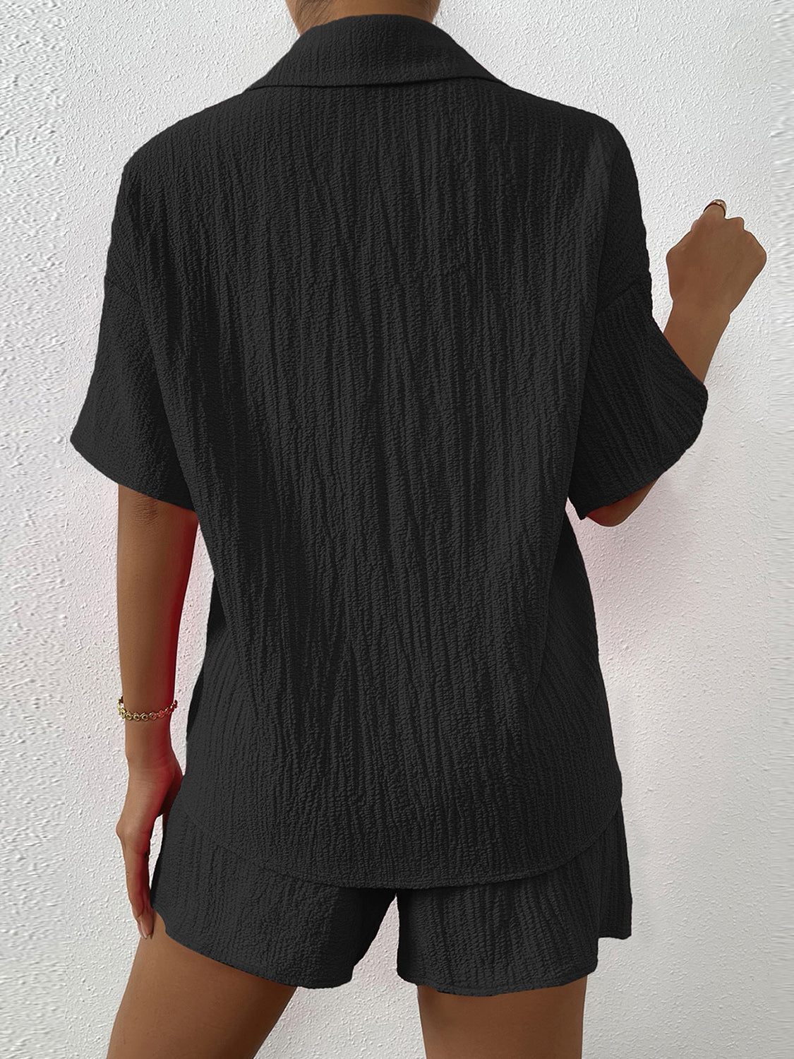 Black textured resort shirt and shorts set with button detail