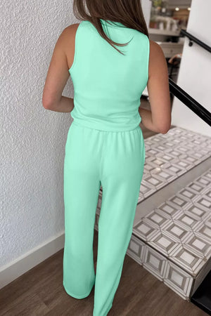 Sleek mint green drawstring lounge set with a sleeveless top and wide-leg pants.