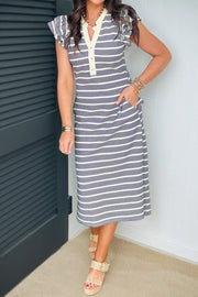 Navy stripe ruffled midi dress with pockets and buttoned neckline.