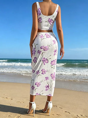 Floral crop top and midi skirt set with purple flowers on white.