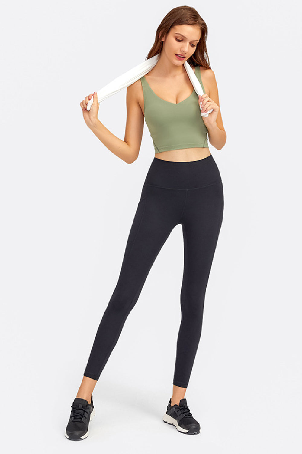 Light Green Sculpted Scoop Neck Crop Top with a white towel draped over the shoulder.