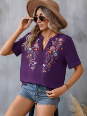 Violet V-neck tee with floral embroidery and crochet trim detail
