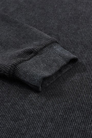 Dark Gray ribbed sweatshirt sleeve detail with textured knit and cuffed hem.
