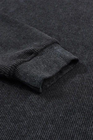 Dark Gray ribbed sweatshirt sleeve detail with textured knit and cuffed hem.